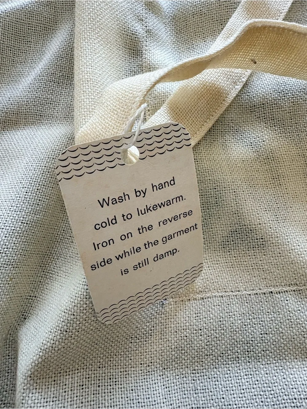 Arola 100% Wool Cream Apron with Black Geometric Pattern